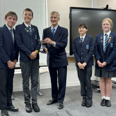 Students from the Gregg School were presented with their trophy by the Lord-Lieutenant of Hampshire